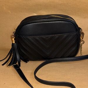 Chic Black Chevron Crossbody Bag with Gold Accents